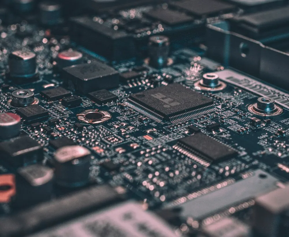 A close-up of a circuit board, representing technology infrastructure.